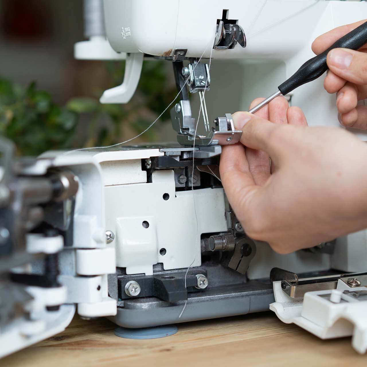 View of a side loaded bobbin and feed dog