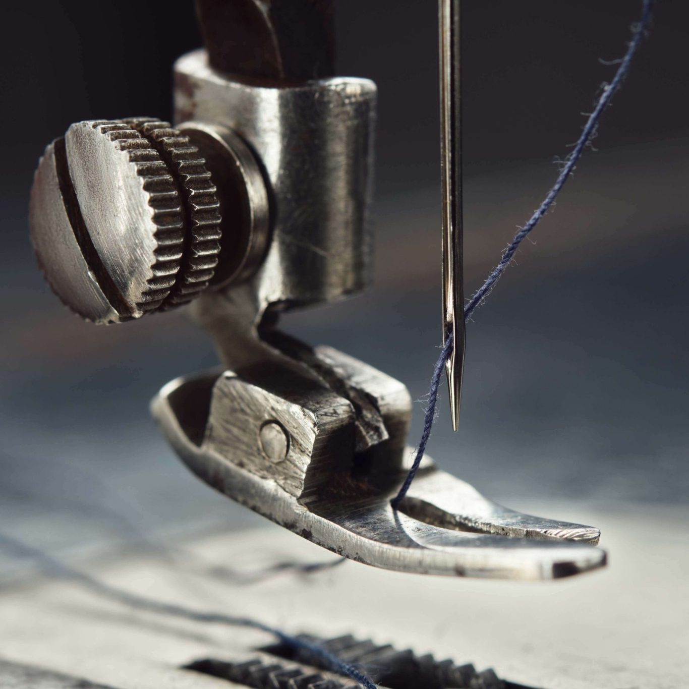 Close Up of Sewing Machine Foot, Needle point and thread